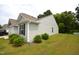 A nice lawn compliments the home's light gray siding at 2039 Alderman Way, Creedmoor, NC 27522