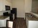 Efficiently designed kitchen featuring granite counters and a breakfast bar at 2039 Alderman Way, Creedmoor, NC 27522