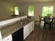 Eat-in kitchen with granite counters and stainless steel sink at 2039 Alderman Way, Creedmoor, NC 27522