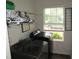 Bright laundry room with full-size washer and dryer and folding area at 2039 Alderman Way, Creedmoor, NC 27522