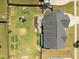 Spacious backyard showcasing a playground, pergola, deck, and garden, great for outdoor enjoyment at 204 Ashland Hill Dr, Holly Springs, NC 27540