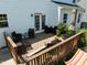 Spacious back deck perfect for entertaining with outdoor furniture and direct access to the home at 204 Ashland Hill Dr, Holly Springs, NC 27540