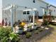 Backyard patio and landscape featuring string lights, pergola, and outdoor decor at 204 Ashland Hill Dr, Holly Springs, NC 27540