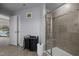 Bathroom featuring walk-in shower with glass door and vanity at 204 Ashland Hill Dr, Holly Springs, NC 27540