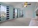 Bright bedroom with striped curtains and ample light at 204 Ashland Hill Dr, Holly Springs, NC 27540