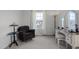 Comfortable bedroom featuring a cozy armchair, vanity, and soft natural light at 204 Ashland Hill Dr, Holly Springs, NC 27540