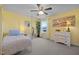 Sunlit bedroom with four-poster bed, decorative accents, and soft neutral tones at 204 Ashland Hill Dr, Holly Springs, NC 27540