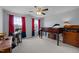 Spacious bedroom with loft bed, large windows and plenty of natural light at 204 Ashland Hill Dr, Holly Springs, NC 27540