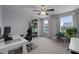 Bright home office featuring a work space, bookshelf, and plenty of natural light at 204 Ashland Hill Dr, Holly Springs, NC 27540
