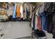 Walk-in closet with shelves and clothing racks offering organized storage space at 204 Ashland Hill Dr, Holly Springs, NC 27540