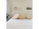 Bedroom featuring a large bed with three striped pillows at 207 N Aiken St, Fuquay Varina, NC 27526