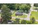 Aerial view of the charming property showing the house and the big backyard at 208 S College Ave, Kenly, NC 27542