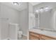 Bathroom features a vanity with a sink, large mirror, and lighting fixtures at 240 Meadow Beauty Dr, Apex, NC 27539