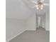 Spacious carpeted bedroom features a ceiling fan and white double door closet at 240 Meadow Beauty Dr, Apex, NC 27539