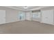 Large bedroom featuring closets and carpet at 240 Meadow Beauty Dr, Apex, NC 27539