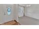 Elegant dining room with wainscoting, large windows, and a stylish chandelier at 240 Meadow Beauty Dr, Apex, NC 27539
