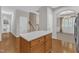 Bright kitchen with hardwood floors and white countertops at 240 Meadow Beauty Dr, Apex, NC 27539