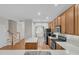 Charming kitchen featuring stainless appliances and wooden cabinetry at 240 Meadow Beauty Dr, Apex, NC 27539