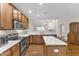 Kitchen with stainless steel appliances and white countertop at 240 Meadow Beauty Dr, Apex, NC 27539