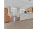 Bright living room with a view of kitchen at 240 Meadow Beauty Dr, Apex, NC 27539