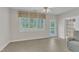 Sunroom with large windows at 240 Meadow Beauty Dr, Apex, NC 27539