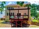 Rear view of home showcasing a spacious deck with seating, perfect for outdoor entertaining at 2501 Springfield Park Dr, Raleigh, NC 27614