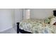 Bedroom features a closet and floral bedding that adds a vibrant touch to the space at 2501 Springfield Park Dr, Raleigh, NC 27614
