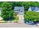 Charming two-story home with manicured landscaping and a welcoming front porch at 2501 Springfield Park Dr, Raleigh, NC 27614