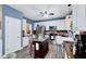 Bright kitchen featuring stainless steel appliances, center island with seating, and modern cabinetry at 2501 Springfield Park Dr, Raleigh, NC 27614