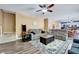 Spacious living room featuring neutral walls, hardwood flooring and comfortable reclining sofas at 2501 Springfield Park Dr, Raleigh, NC 27614