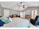 Well lit main bedroom featuring vaulted ceilings, and multiple closets at 2501 Springfield Park Dr, Raleigh, NC 27614