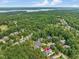 Aerial view of Chapel Hill home in wooded lot near community lake at 259 Brown Bear, Chapel Hill, NC 27517