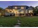Expansive backyard with patio, hot tub, grill, and outdoor seating area perfect for entertaining at 259 Brown Bear, Chapel Hill, NC 27517