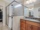 Bathroom with a glass-enclosed shower and granite countertops and double sinks at 259 Brown Bear, Chapel Hill, NC 27517