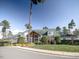 A beautiful clubhouse on a manicured lawn with nice trees and landscaping at 259 Brown Bear, Chapel Hill, NC 27517