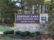 The Jordan Lake State Recreation Area Visitor Center sign is on a beautiful stone wall at 259 Brown Bear, Chapel Hill, NC 27517