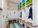 Mudroom with built-in storage, bench seating, and cubbies at 259 Brown Bear, Chapel Hill, NC 27517