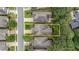Aerial view of a home showcasing its roof shape and surrounding landscaping at 260 Easy Wind Ln, Garner, NC 27529