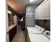 Bathroom with a combination of laundry room that includes modern washer and dryer at 2657 Joel Johnson Rd, Lillington, NC 27546