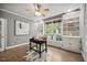 Bedroom with built-in shelves, hardwood flooring, and a window seat providing an inviting and cozy retreat at 2725 Rosedale Ave, Raleigh, NC 27607