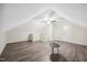 Large bonus room featuring new floors, modern light fixtures, and neutral paint at 2725 Rosedale Ave, Raleigh, NC 27607