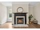 Elegant fireplace featuring a marble hearth and a decorative mantel at 2725 Rosedale Ave, Raleigh, NC 27607