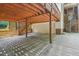 Spacious garage with a carport, and a convenient stairway up to the main level of the home at 2725 Rosedale Ave, Raleigh, NC 27607