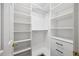 Organized walk-in closet with custom built-in shelving and drawers at 2725 Rosedale Ave, Raleigh, NC 27607