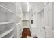 Large walk-in closet with custom shelving, drawers, and ample storage space at 2725 Rosedale Ave, Raleigh, NC 27607