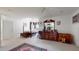 Spacious bedroom offering a four-poster bed, light-colored carpet, and plentiful natural lighting at 2816 Shepard School Rd, Zebulon, NC 27597