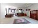 Spacious bedroom with ample natural light, a four-poster bed, ceiling fan, and plenty of room at 2816 Shepard School Rd, Zebulon, NC 27597