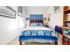 Comfortable bedroom with blue accents and natural light, offering a cozy and inviting atmosphere at 2816 Shepard School Rd, Zebulon, NC 27597