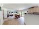 Open floor plan with dining area, tiled flooring and lots of natural light at 2816 Shepard School Rd, Zebulon, NC 27597