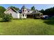Home exterior with unique architecture and plenty of yard space at 2816 Shepard School Rd, Zebulon, NC 27597